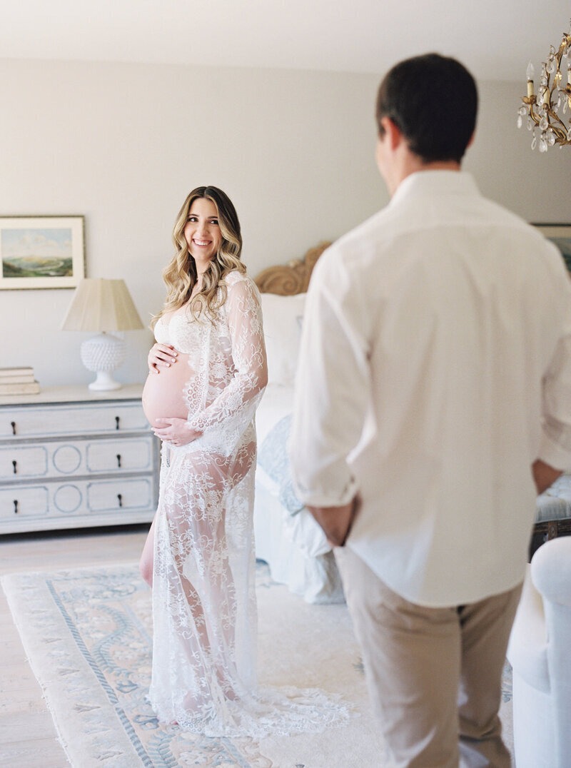 portrait of a pregnant woman, withher hands on her belly, because she knew how to prepare for maternity photoshoot
